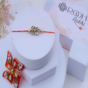 Vibrant Leaf Shaped Kundan Rakhi